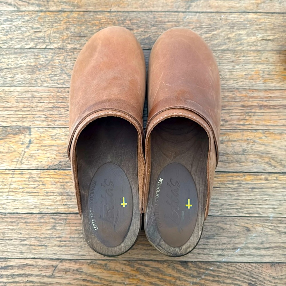 Brown wooden swedish clogs